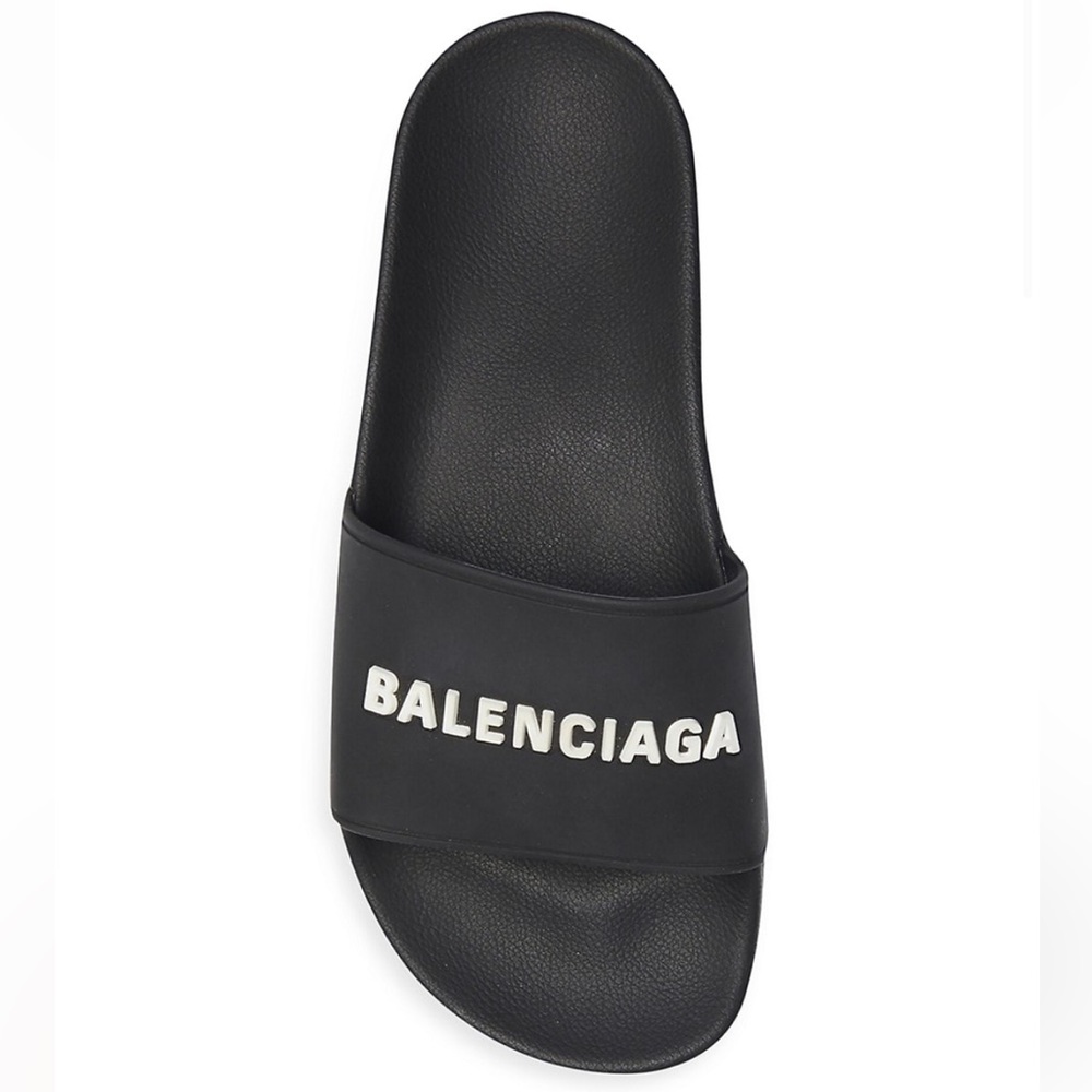 Black Balenciaga pool slides